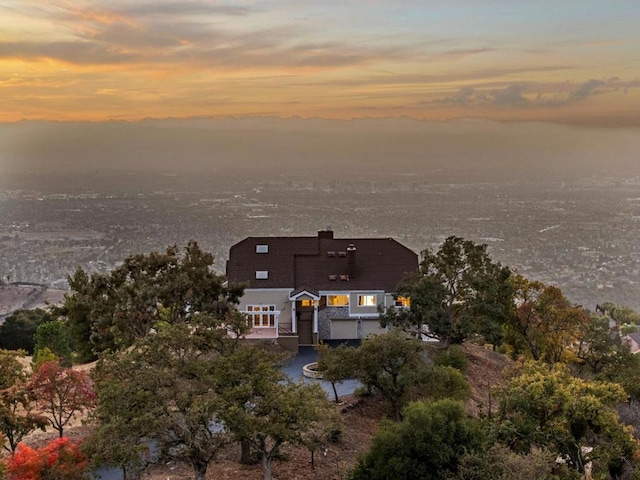 view of aerial view at dusk