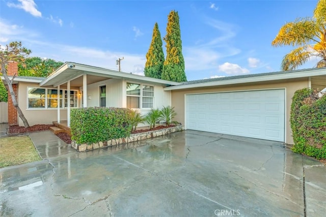 13621 Arcturus Ave, Gardena, CA 90249 - ranch-style home with driveway, an attached garage, and stucco siding