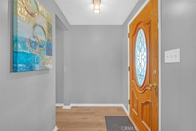 13621 Arcturus Ave, Gardena, CA 90249 - foyer entrance featuring wood finished floors and baseboards