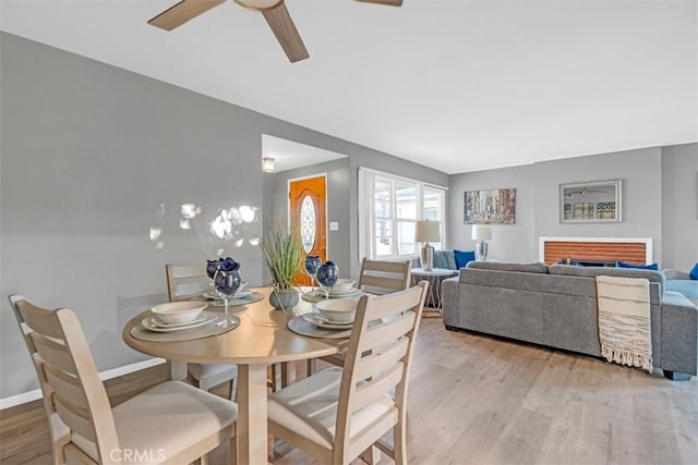 13621 Arcturus Ave, Gardena, CA 90249 - dining area with light wood finished floors and a ceiling fan