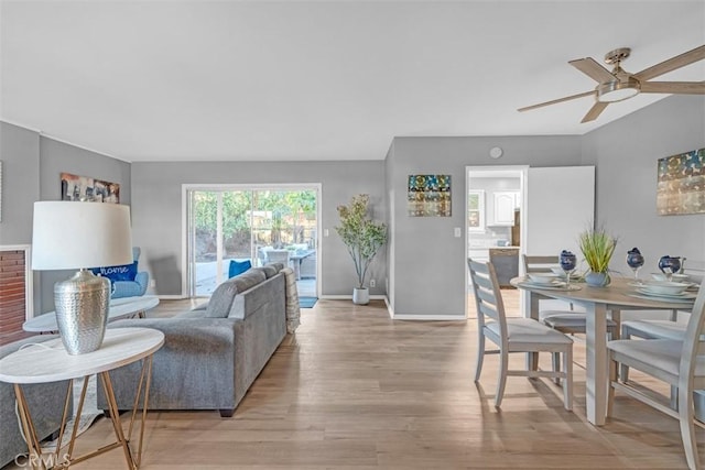 13621 Arcturus Ave, Gardena, CA 90249 - living area with light wood-style flooring and a ceiling fan