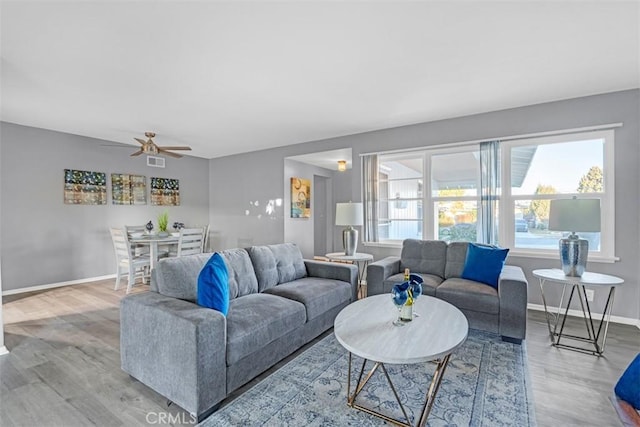13621 Arcturus Ave, Gardena, CA 90249 - living area featuring wood finished floors and ceiling fan