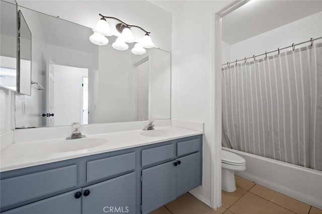 full bathroom with tile patterned floors, vanity, shower / bath combination with curtain, and toilet