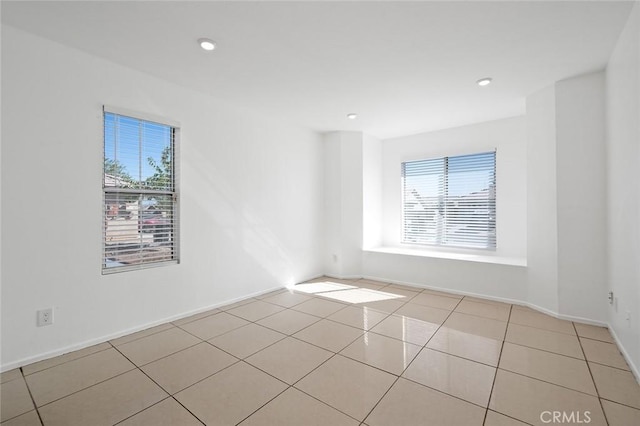 view of tiled spare room