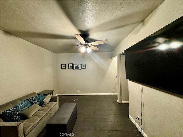 unfurnished living room with a textured ceiling and ceiling fan