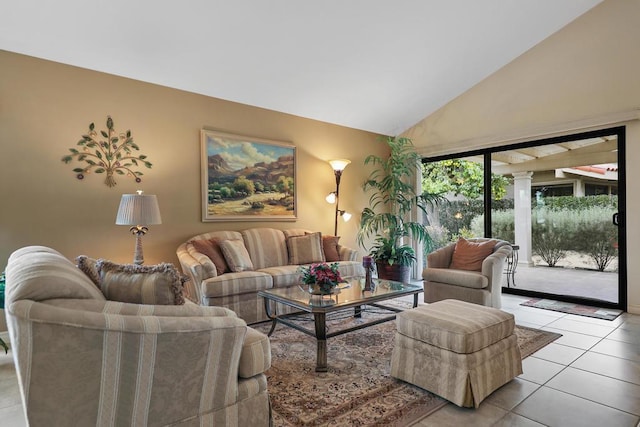 living room with light tile patterned floors and high vaulted ceiling