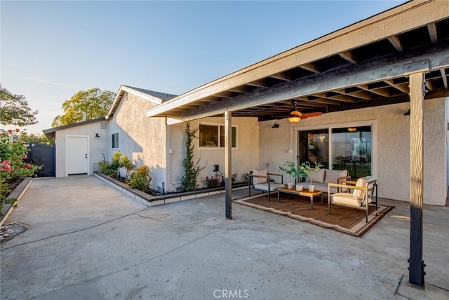 view of patio with ceiling fan and an outdoor hangout area