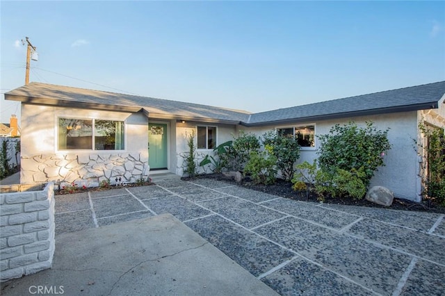 single story home with a patio