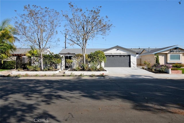 single story home with a garage