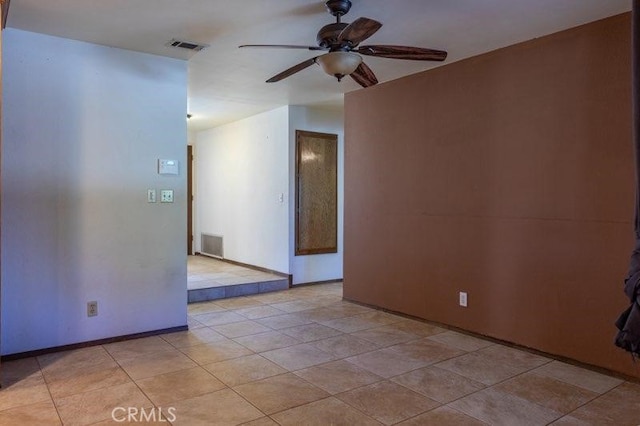 spare room with ceiling fan