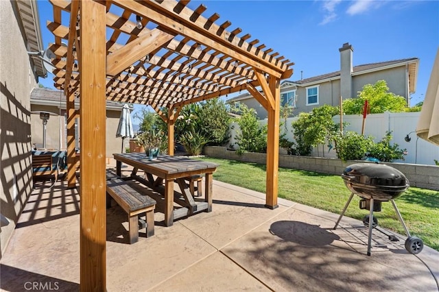 view of patio featuring a grill and a pergola