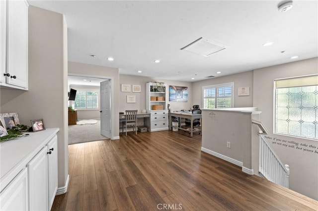 interior space with dark hardwood / wood-style flooring