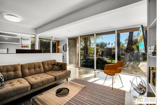 living room with ceiling fan