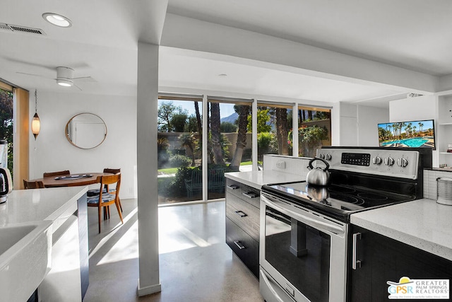 kitchen featuring ceiling fan and stainless steel electric range