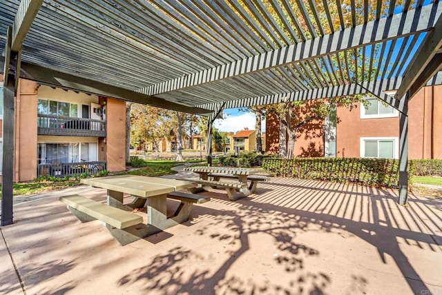 view of home's community featuring a pergola