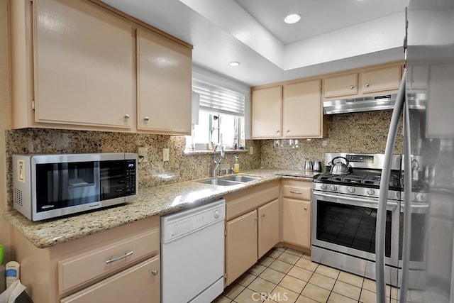 kitchen with tasteful backsplash, stainless steel appliances, extractor fan, sink, and light tile patterned floors