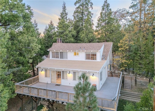 view of front of property with a deck