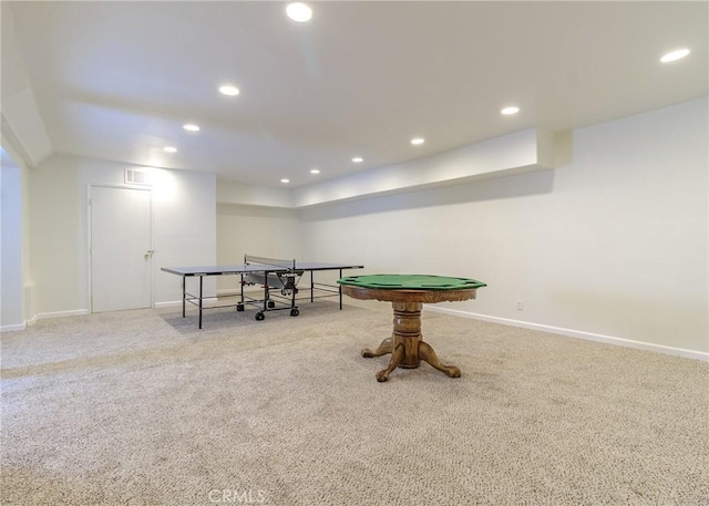 game room with light colored carpet