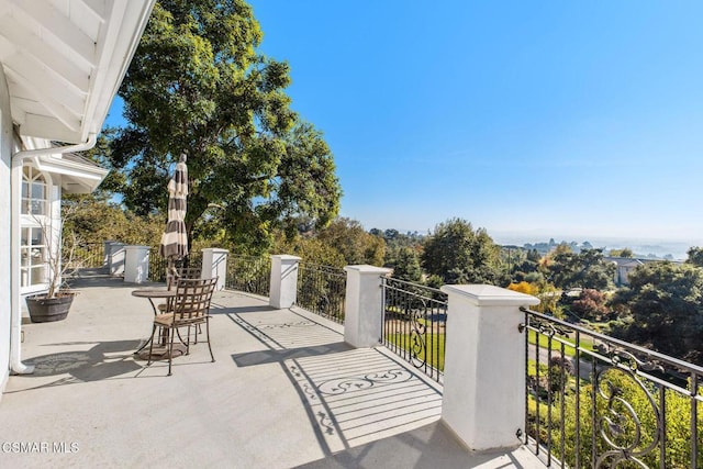 view of patio / terrace with a balcony