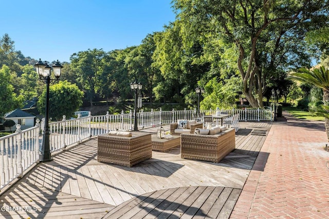 deck with an outdoor hangout area