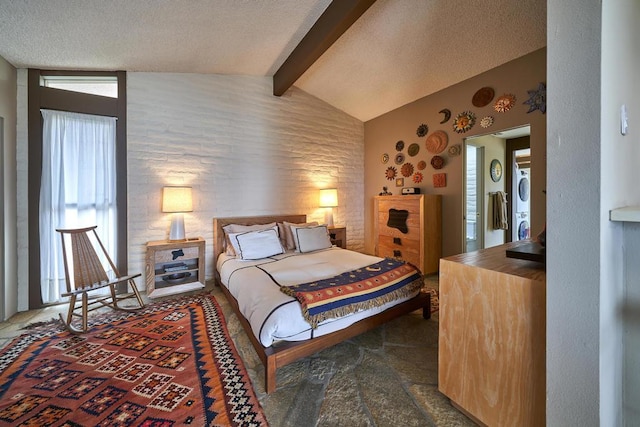 bedroom featuring multiple windows, lofted ceiling with beams, and a textured ceiling