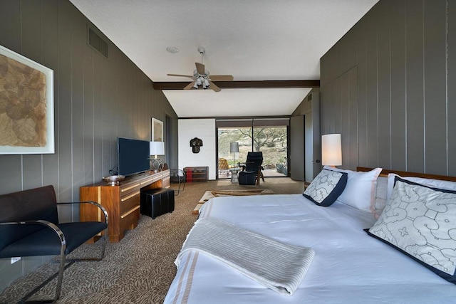 carpeted bedroom featuring lofted ceiling with beams and ceiling fan