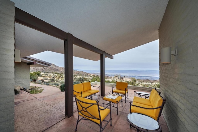 view of patio with a mountain view