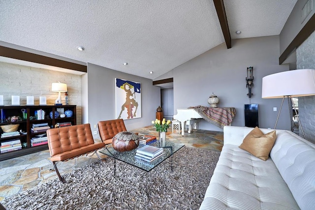 living room featuring vaulted ceiling with beams and a textured ceiling