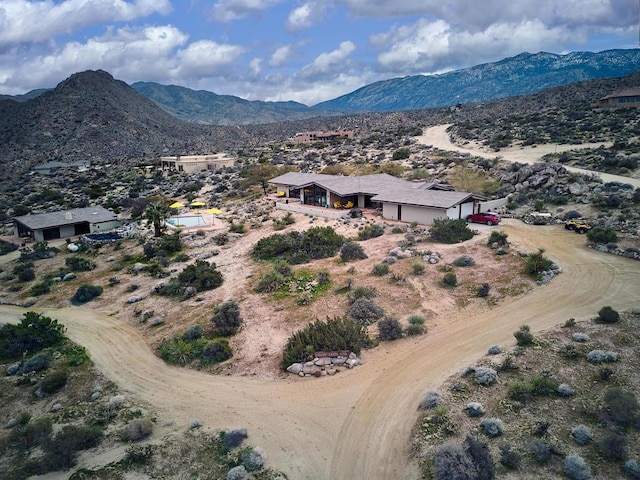 drone / aerial view featuring a mountain view