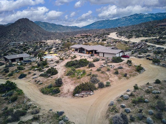 bird's eye view with a mountain view