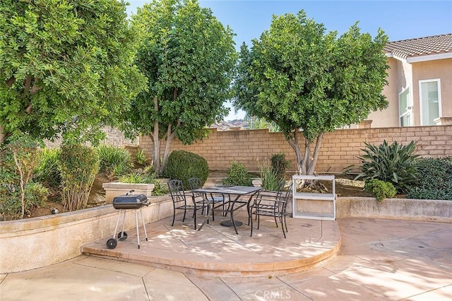 view of patio with area for grilling