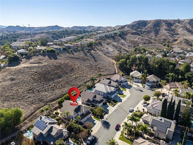 drone / aerial view featuring a mountain view