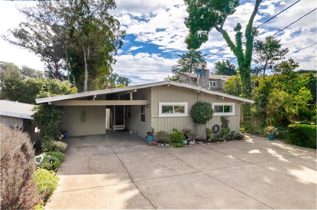 single story home with a carport