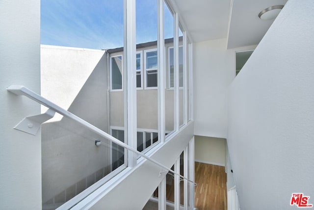 stairway with wood-type flooring