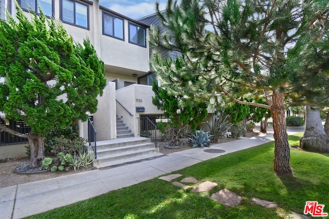 exterior space with a front yard