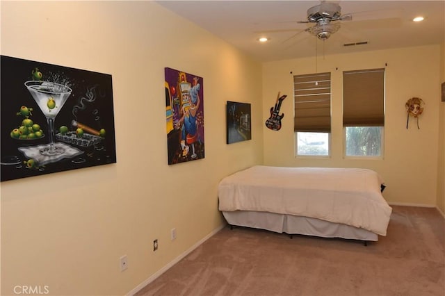 carpeted bedroom with ceiling fan