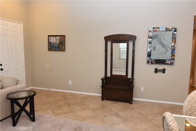 sitting room with light tile patterned floors