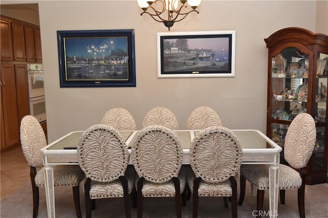 carpeted dining space with a notable chandelier