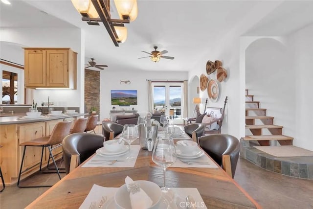 dining area with ceiling fan