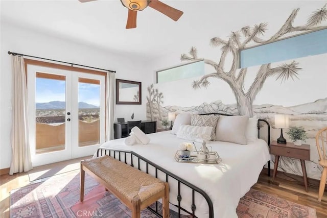 bedroom with access to outside, ceiling fan, french doors, and wood-type flooring