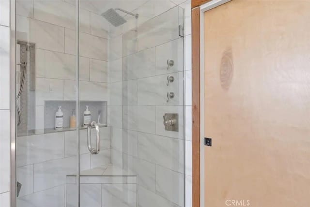 bathroom featuring walk in shower