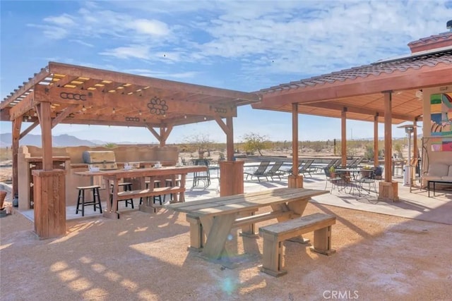 view of home's community featuring a pergola