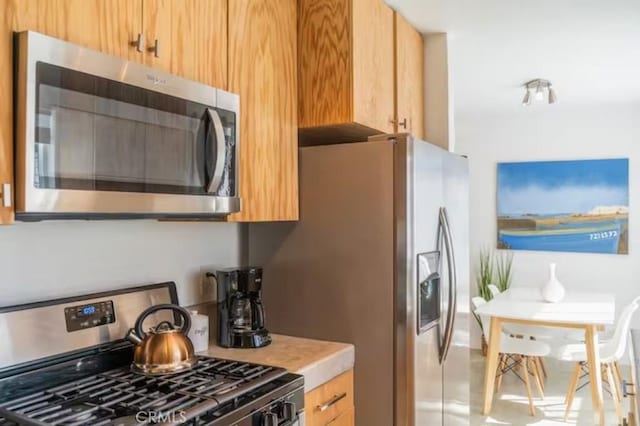 kitchen with appliances with stainless steel finishes