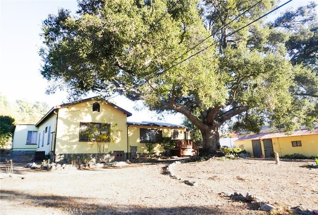 view of front of property featuring a deck