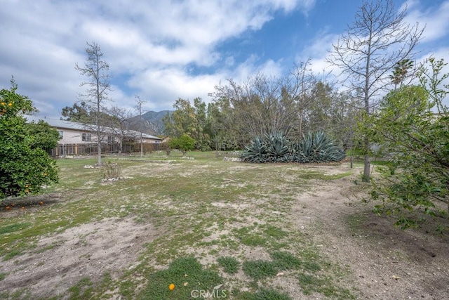 view of yard featuring fence