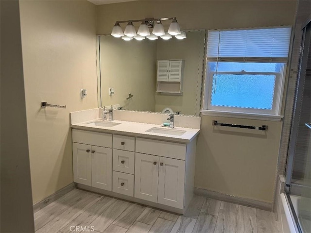 bathroom featuring wood-type flooring and vanity