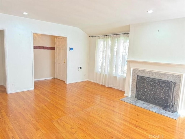 unfurnished living room featuring light hardwood / wood-style flooring