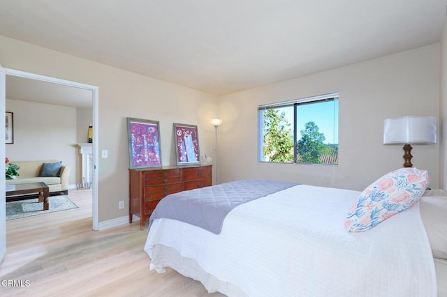 bedroom with light hardwood / wood-style flooring