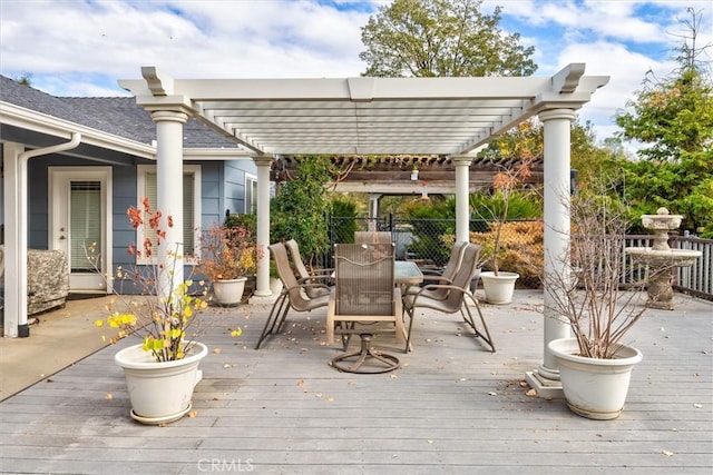 wooden terrace with a pergola