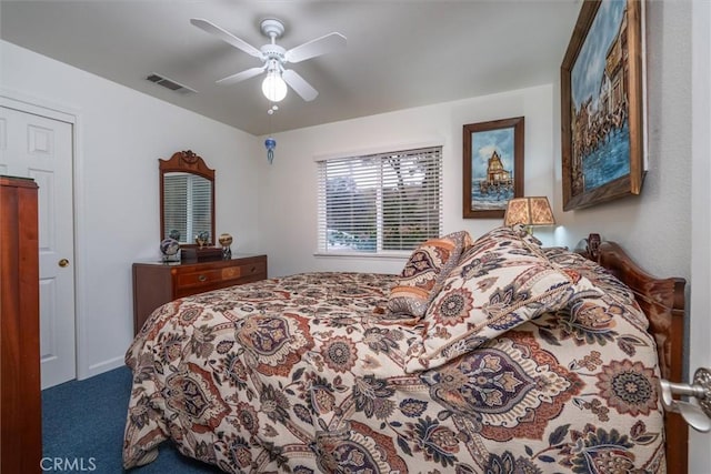 carpeted bedroom featuring ceiling fan